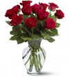Arreglo de 12 rosas en florero