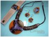 Juego Africa con Colgante, aretes, anillo y brazalete de cuero